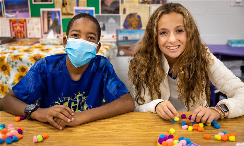 Students make pyramids out of various materials